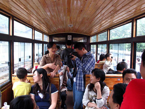Ticket price of the sightseeing train is 50 Yuan (about 7.2 USD). Many tourists would come to take the train in holidays. 